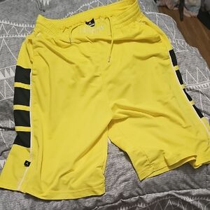 Jordan Yellow and Black Athletic Shorts with Bold Stripes
